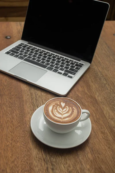 Coffee and notebook on the wood — Stock Photo, Image