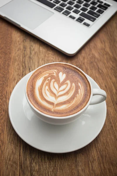 Coffee and notebook on the wood — Stock Photo, Image