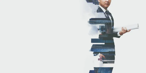 Double exposure of a businessman working and cityscape on whit b — Stock Photo, Image