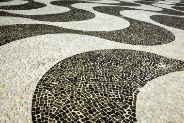 Siyah ve beyaz ikonik mozaik desen Copacabana Plajı, Rio de Janeiro, Brezilya eski tasarım tarafından
