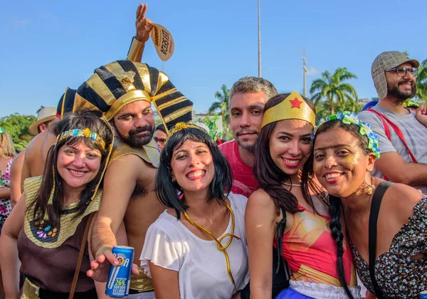 People in costumes of Egypt Pharaoh, Cleopatra, Wonder Woman and Frida Kahlo at Bloco Orquestra Voadora, Carnaval 2017