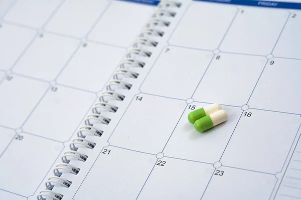 Pills on the calendar book