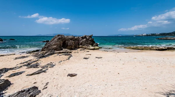 Beautiful sand along rock beach — Stock Photo, Image