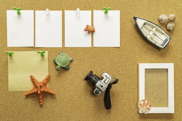 Announcement board with camera, boat, Photo frame, star fish and Turtles