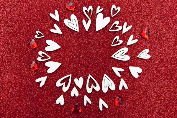 Hearts pattern on glitter red background with free place for tex — ストック写真