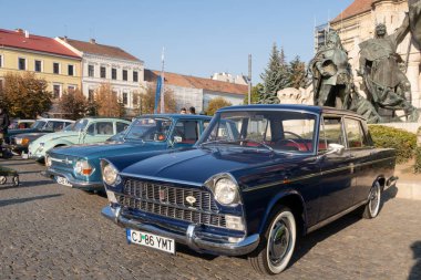 Cluj Napoca, Romania - 26 Oct, 2019: Visitors at the Retro Mobile Autumn Parade in Cluj Napoca, Romania, Oldtimer Show in Cluj Napoca. FIAT 