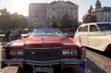 Cluj Napoca, Romania - 26 Oct, 2019: Visitors at the Retro Mobile Autumn Parade in Cluj Napoca, Romania, Oldtimer Show in Cluj Napoca. 