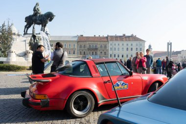 Cluj Napoca, Romania - 26 Oct, 2019: Visitors at the Retro Mobile Autumn Parade in Cluj Napoca, Romania, Oldtimer Show in Cluj Napoca. Porsche