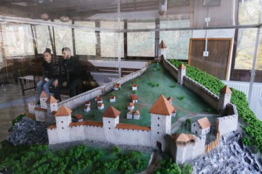 Brasov, Romania - Nov 09, 2019: A Scale model the old Brasov Citadel at The lower cable car station rising from Brasov to Mount Tampa, Romania
