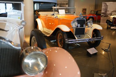 Athens, Greece - Dec 22, 2019: Interior view of the Hellenic Motor Museum in Athens city. Collection of old time classic cars from around the world