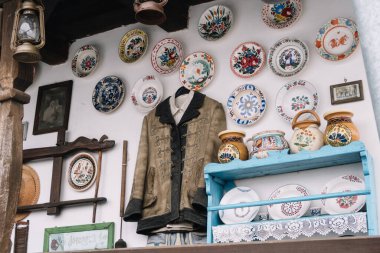 Praid, Romania - Dec 07, 2019: Collection of  Hungarian national costumes and another traditional folklore items in  Transylvania, Praid, Europe, Romania. 
