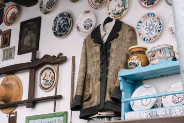 Praid, Romania - Dec 07, 2019: Collection of  Hungarian national costumes and another traditional folklore items in  Transylvania, Praid, Europe, Romania. 