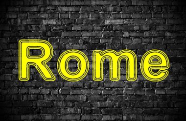 Roma siyah tuğla duvarda. Görüntü.