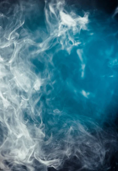 Smoke on blue light background — Stock Photo, Image