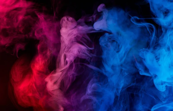 Humo multicolor sobre negro —  Fotos de Stock