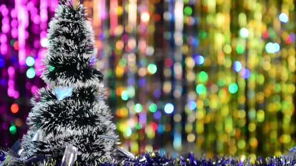Weihnachtsbaum Auf Hellen Bunten Feiertagshintergrund Mit Blinkenden Lichtern — Stockvideo