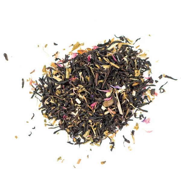 pile of natural black tea mix contains tea bud, ivan tea, echinacea, lemon balm, petals, pink cornflower and mallow