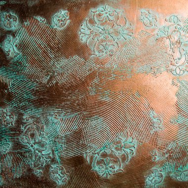 abstract colorful patterns over shiny bronze cement texture