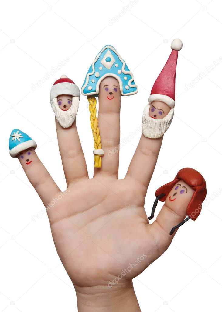 Fingers men winter hats of clay. Merry Christmas!