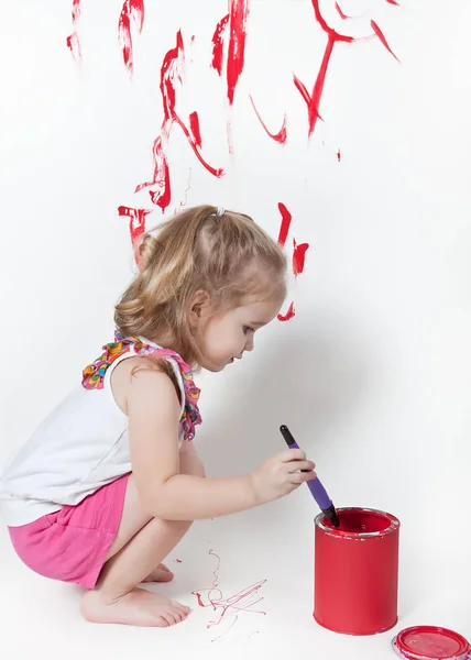 Young artist with paint and brush — Stock Photo, Image