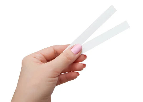 Female hand with two paper test strips for the perfume — Stock Photo, Image