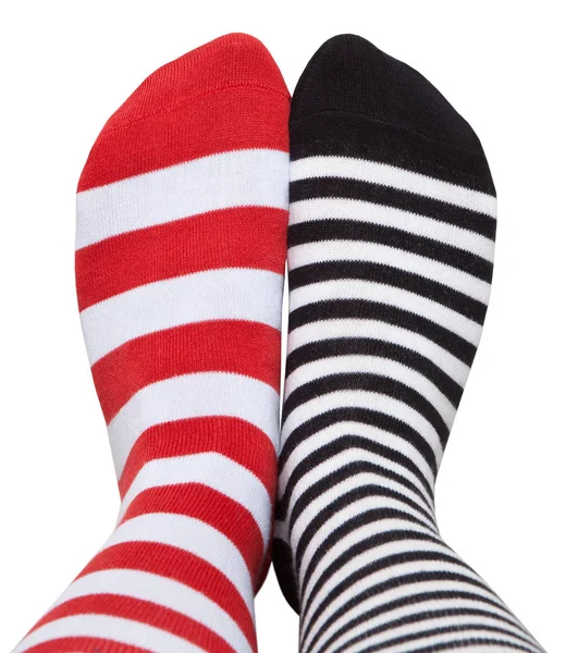 Beine Verschiedenen Gestreiften Socken Isoliert Auf Weißem Hintergrund — Stockfoto