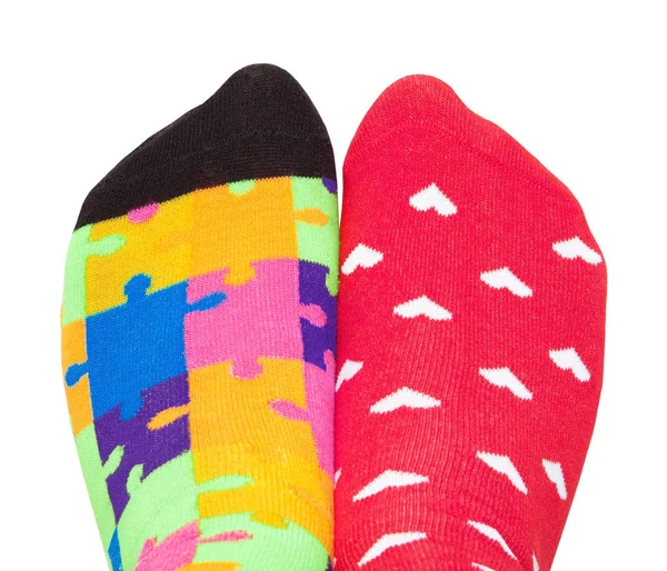 Ein Paar Füße Verschiedenen Socken Isoliert Auf Weißem Hintergrund — Stockfoto