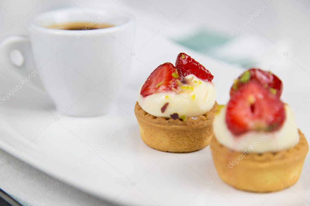Sicilian pastry and coffee on white dish