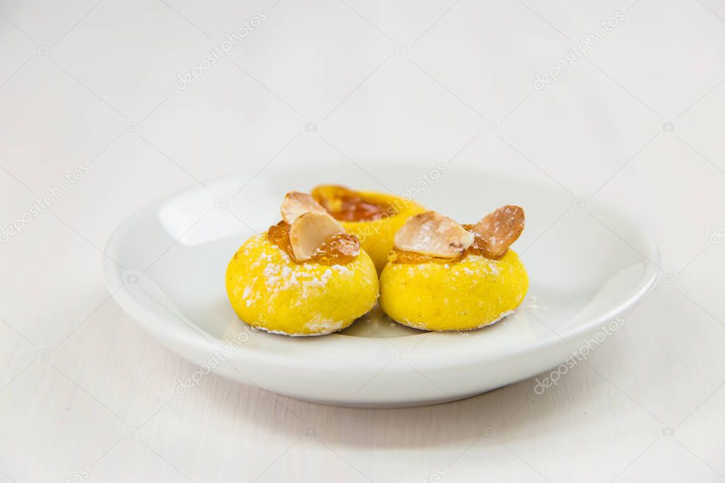 Sicilian pastry on white circular dish