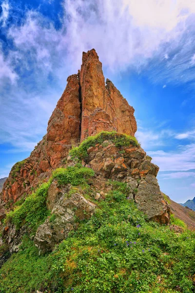 Pointed steep red rock on watershed ridge — Stock Photo, Image