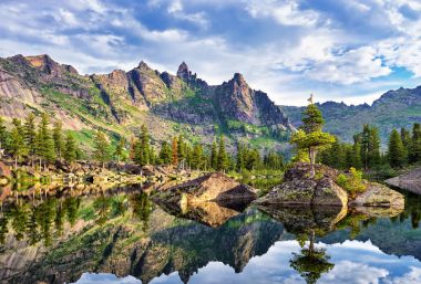 Picturesque lake in Siberian mountains clipart