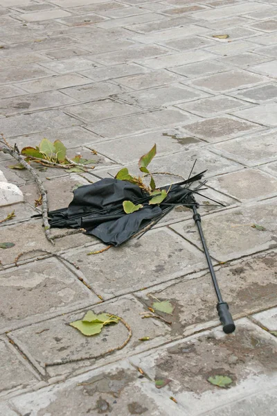 broken umbrella in street of Venice