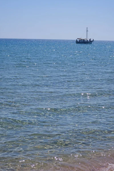 Agathi beach in Rhodes and a ship — 스톡 사진