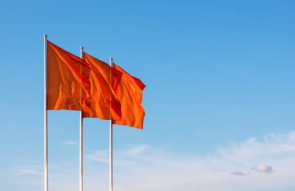 Three red blank flags waving in the wind — Stock Photo, Image