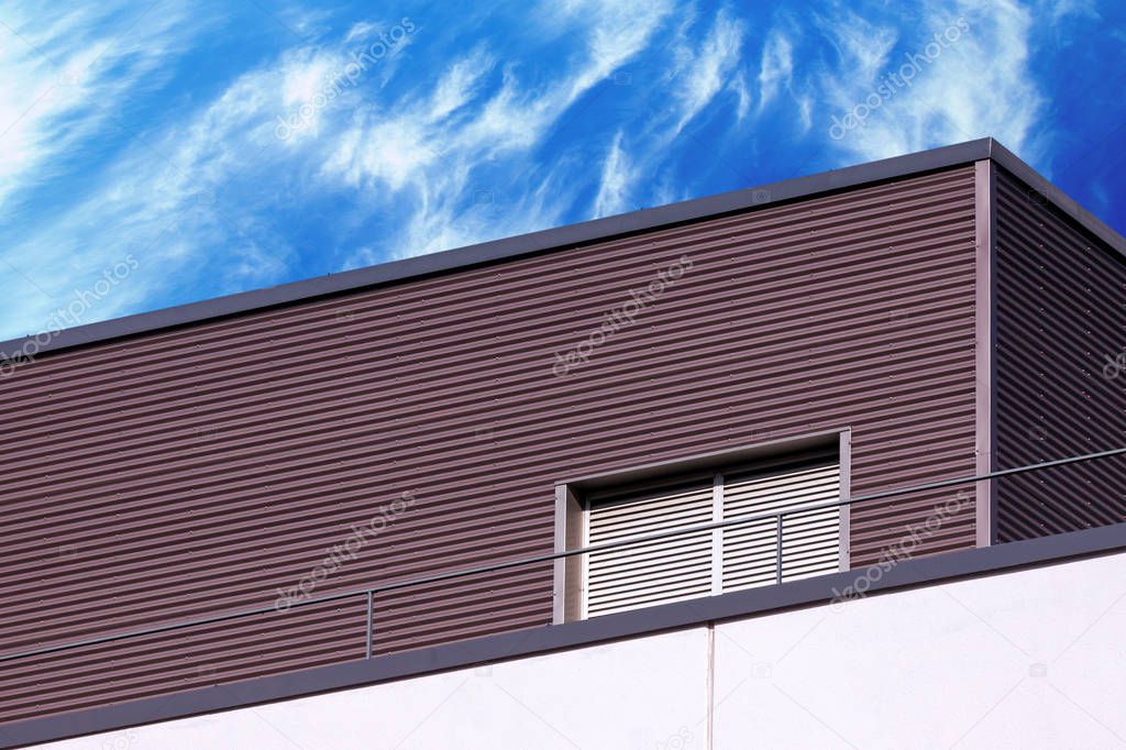 Abstract modern building detail and cloudy sky