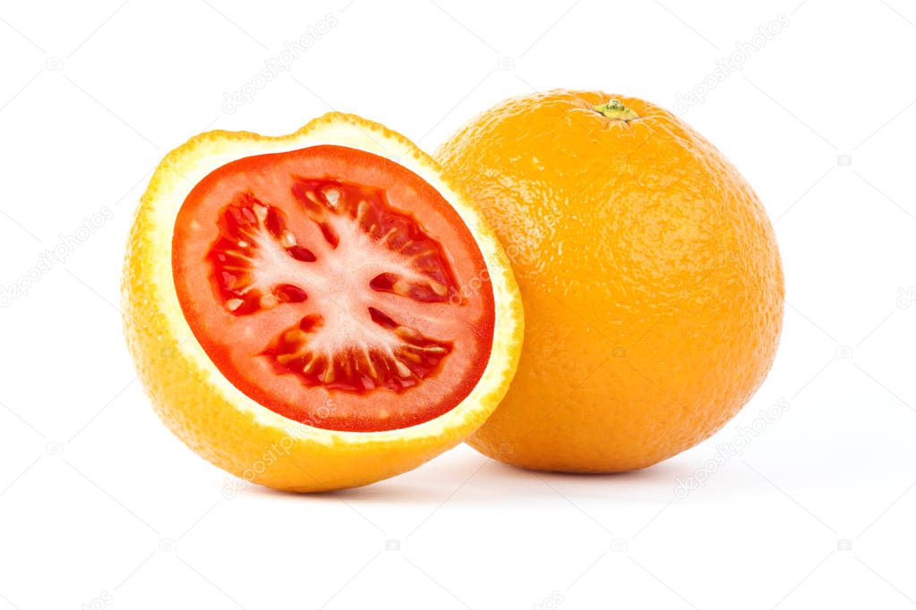 Sliced orange with red tomato inside