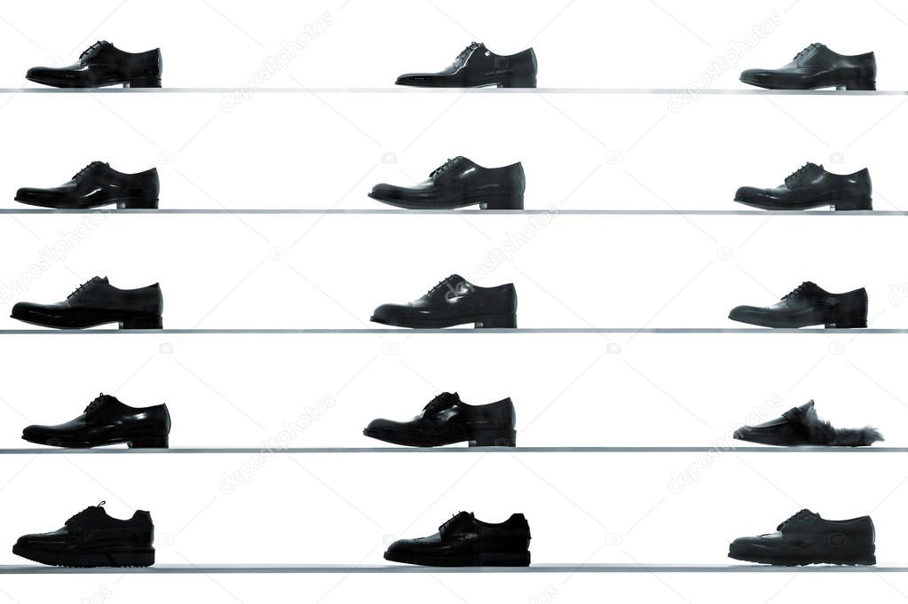 Men classic shoes displayed on shop shelves