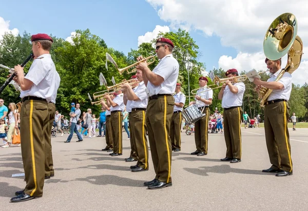 Military brass big band playing on the street — Stock Photo, Image