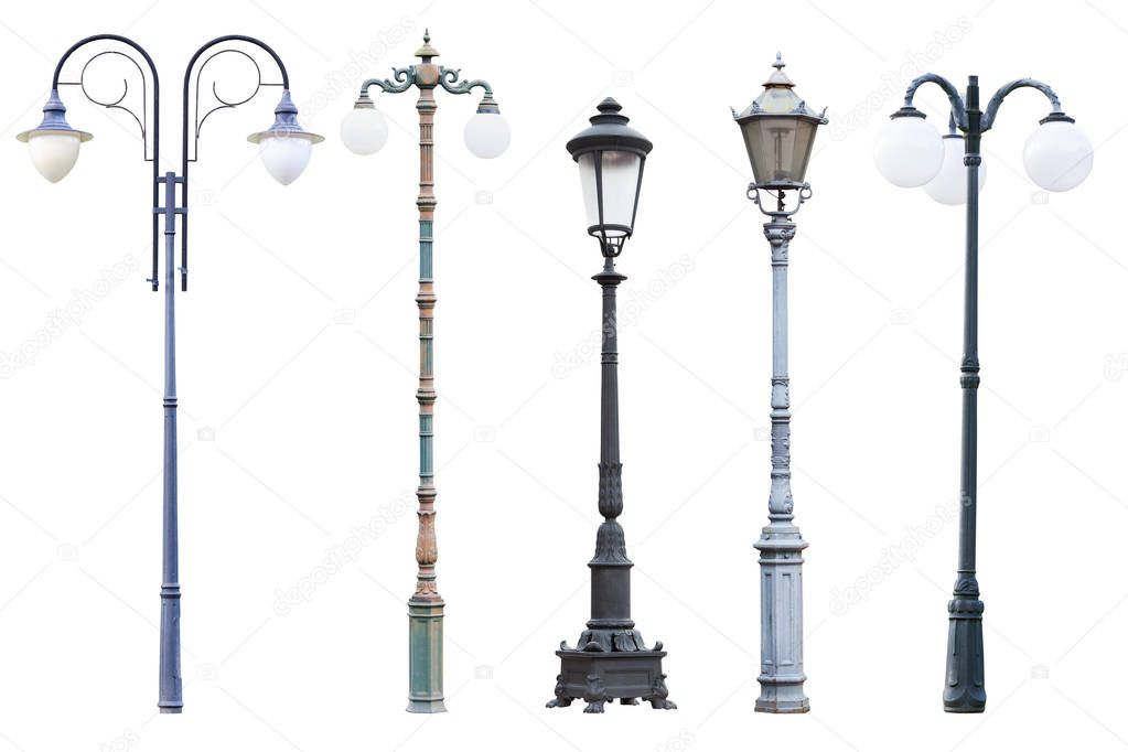 Real vintage street lamp posts and lanterns isolated on white background