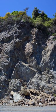 Paket fişi ve Rock slayt satır bir otoyol güneyinde Kaikoura, Yeni Zelanda.