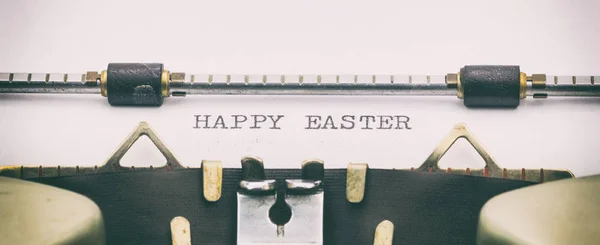 HAPPY EASTER in capital letters on a typewriter sheet — Stock Photo, Image
