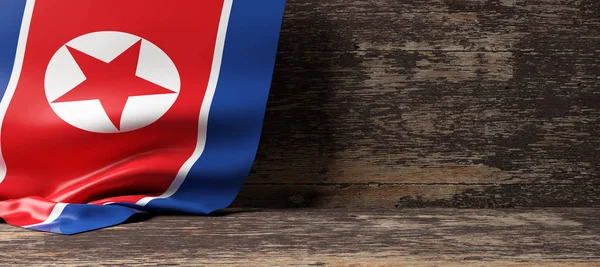 Bandeira da Coreia do Norte em fundo de madeira. ilustração 3d — Fotografia de Stock