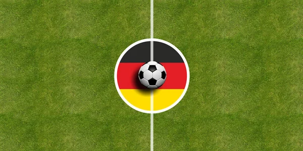 Flaga Niemiec na środku pola piłka nożna — Zdjęcie stockowe
