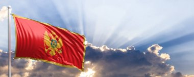 Karadağ bayrağı mavi gökyüzü. 3D çizim