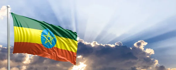 Etiopía bandera en el cielo azul. ilustración 3d —  Fotos de Stock