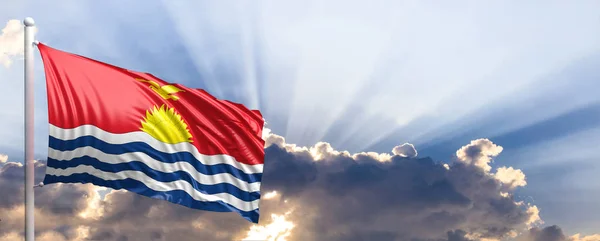 De vlag van Kiribati op blauwe hemel. 3D illustratie — Stockfoto