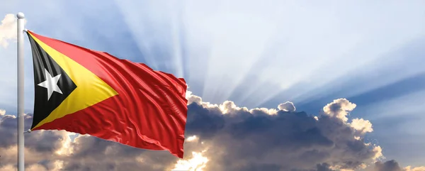 Timor vlag op blauwe hemel. 3D illustratie — Stockfoto