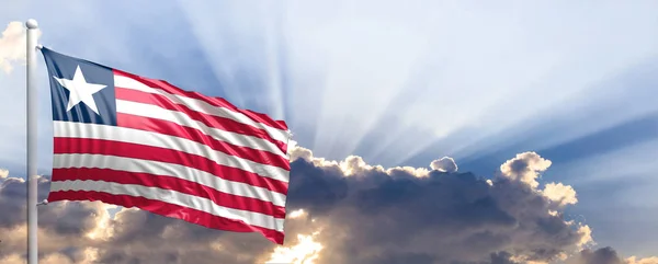 Liberia flag on blue sky. 3d illustration — Stock Photo, Image