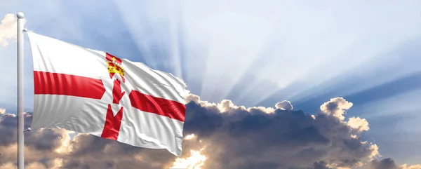 De vlag van Noord-Ierland op blauwe hemel. 3D illustratie — Stockfoto