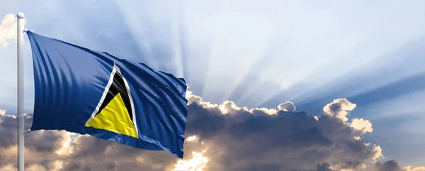 Saint Lucia zászlaja, a kék ég. 3D-s illusztráció — Stock Fotó